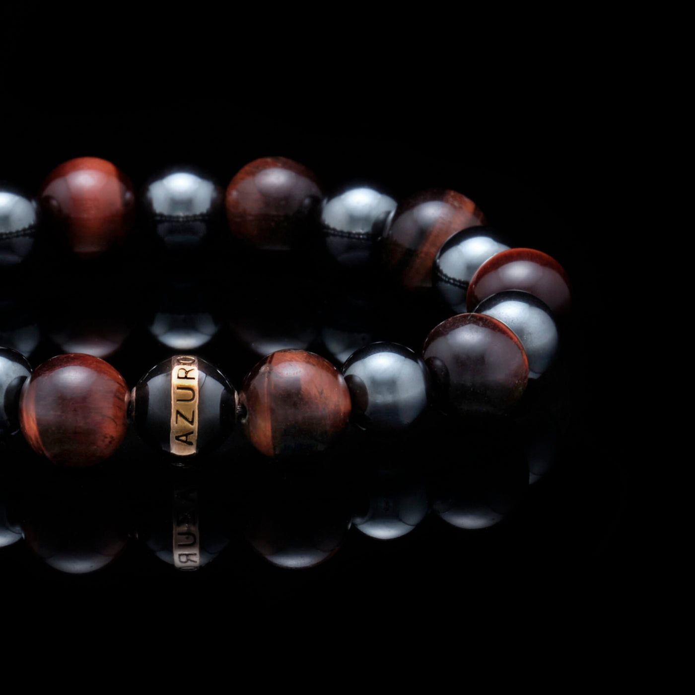 The Maximus, meaning "greatest" in Latin, is the symbolic red tiger eye bracelet for the ultimate fighter. The chakra healing bracelet promotes the properties of both red tiger eye and hematite, and act as a stimulating force of support for the feisty spirit of life. Red tiger eye bracelet infuses motivational energy, and with the gladiator-like Maximus, it will inject fuel for a boost of confidence for the man who strives to be the Greatest of All Time.