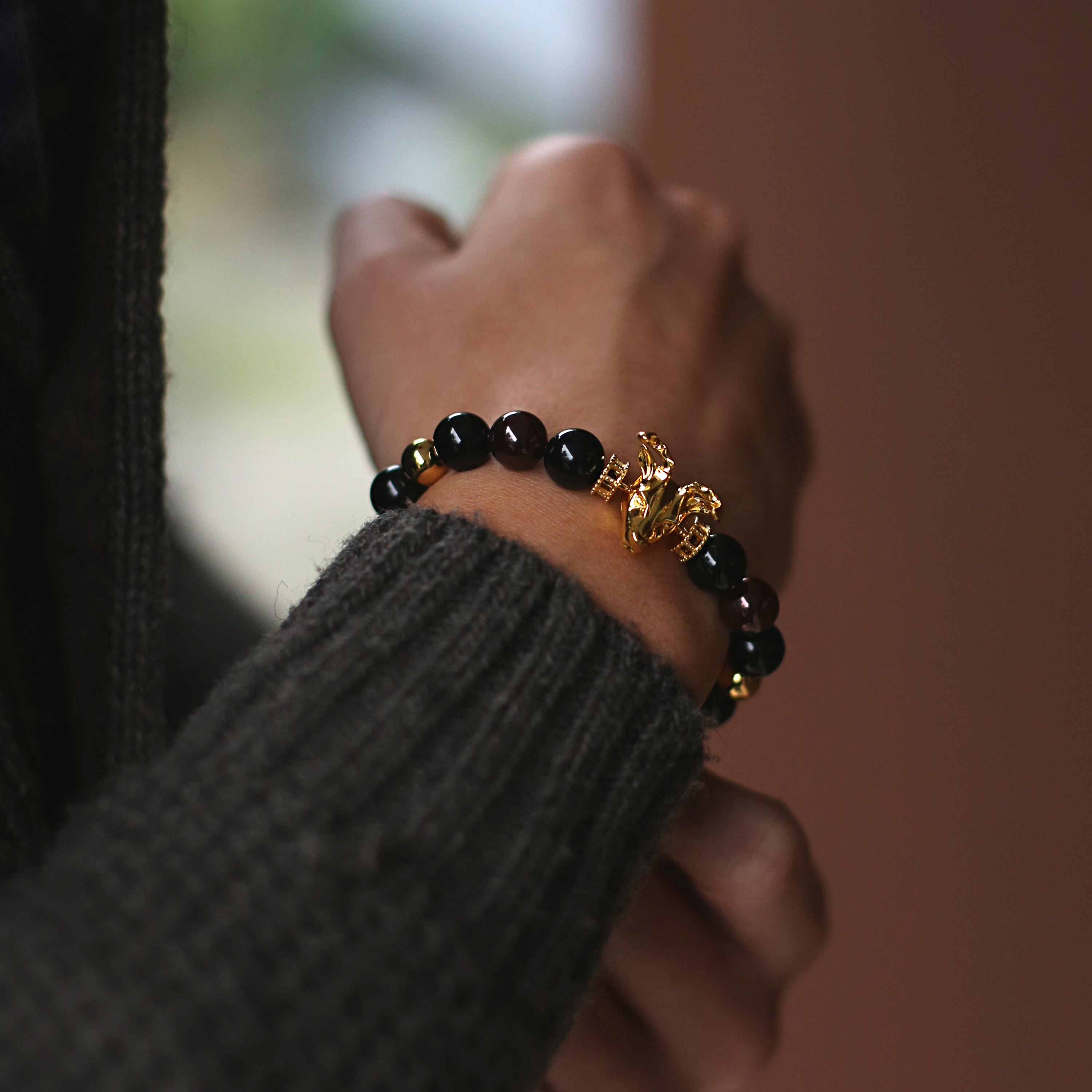 The Gold Deer bracelet idea originated from Milwaukee. It is a masculine figure in the wild forest. Gold beaded bracelet with obsidian and tiger eye bracelet crystal uplifts inner strength and absorbs negativity. The custom Gold Deer bracelet with gold plated beads and tiger eye bracelet and obsidian crystals are a great men's bracelet to collect.