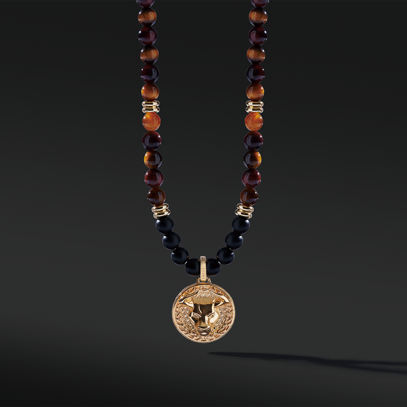 Tiger Eye beaded pendant necklace brings wealth and luck. A bottom set of Obsidian crystals highlights the detail of the silver pendant. Tiger Eye, Obsidian crystals amplify the healing properties of protection and prosperity. Azuro gold pendants provide options to complete all whole styles. Explore your gold pendant necklaces with us.