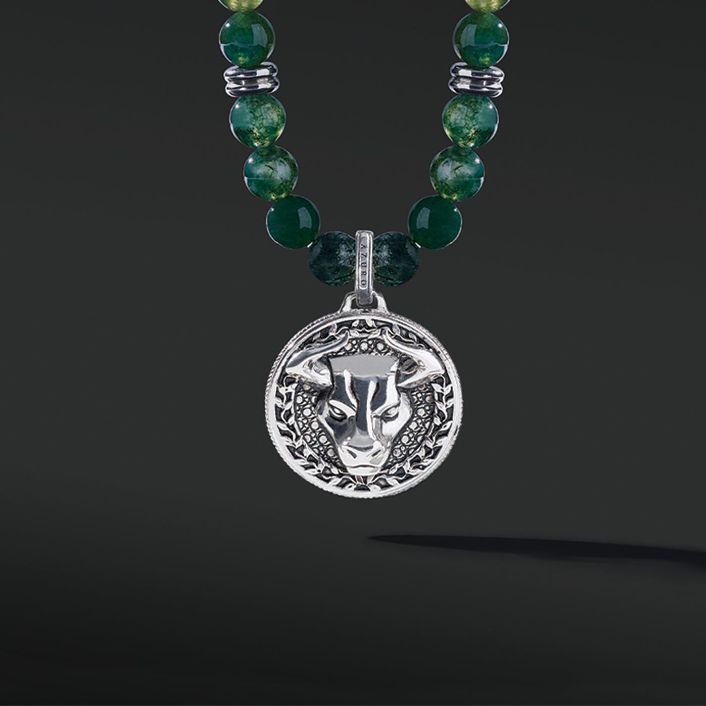 Know as the Green Moss Agate. One of the rarest agate crystals. Put 3 different tonalities of green Agate showcasing the richness of its presentation. Silver pendant necklace for men in green Agate has a gentle, sophisticated touch, and green Agate necklace releases stress and anxiety.
