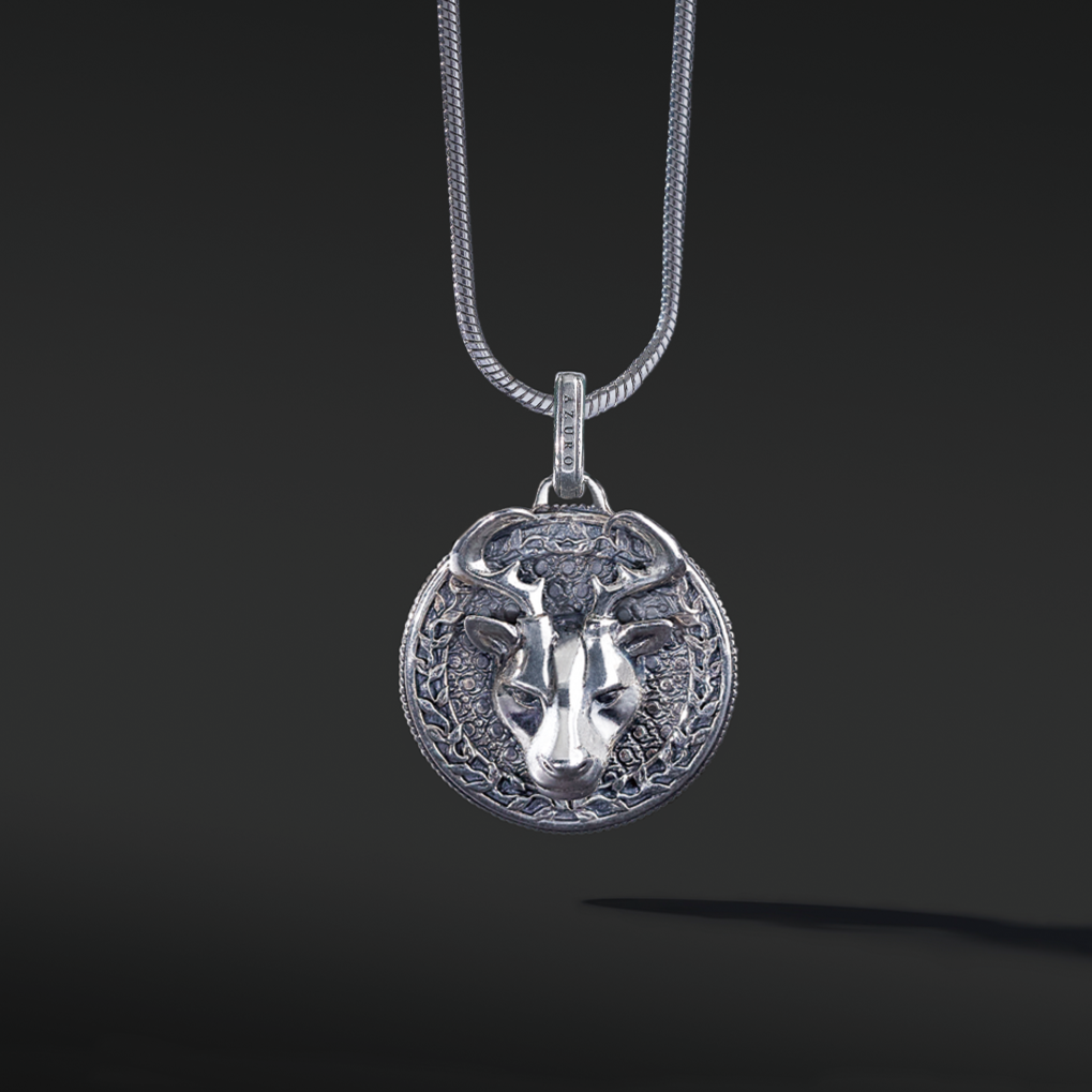 The silver deer pendant necklace for men is a unique existing. The idea originated from Milwaukee, Wisconsin. The deer is a masculine figure in the wild forest. If you are confident enough to master the bold silver pendant design, this buck head is a must-have silver pendant for men.