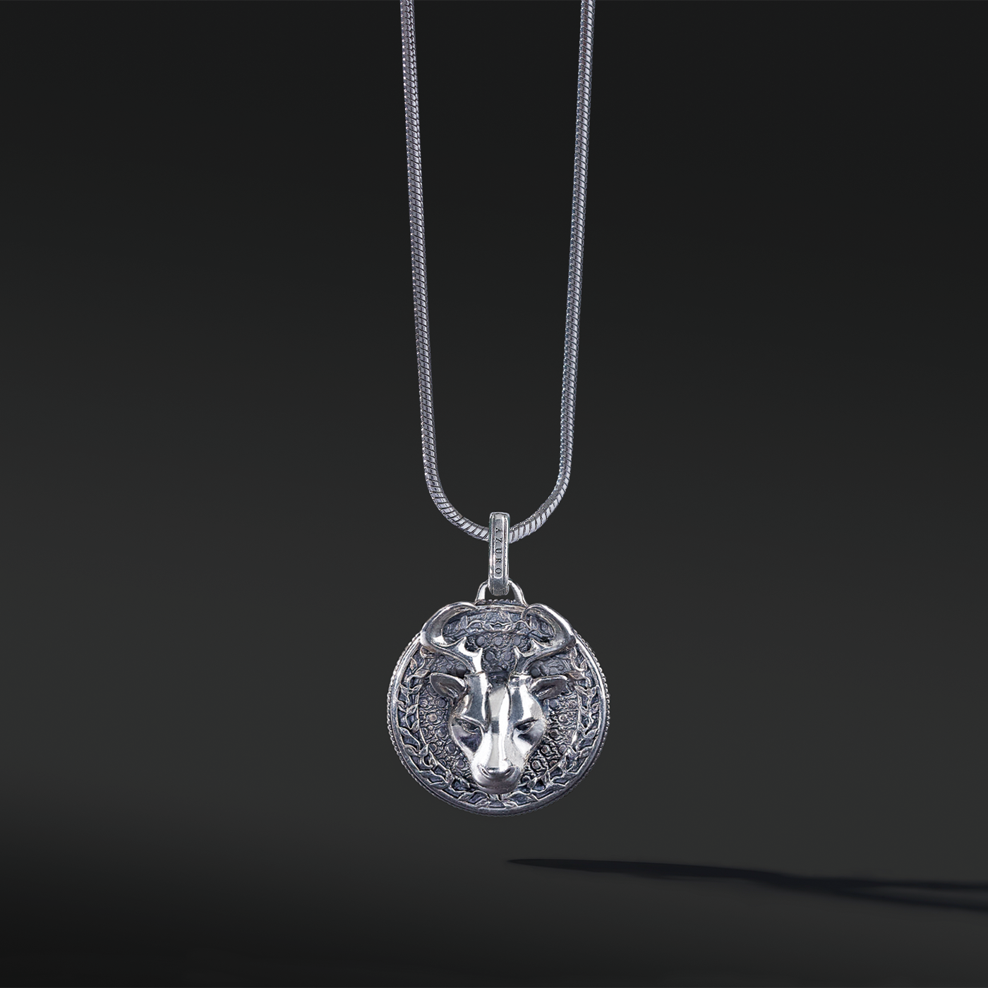The silver deer pendant necklace for men is a unique existing. The idea originated from Milwaukee, Wisconsin. The deer is a masculine figure in the wild forest. If you are confident enough to master the bold silver pendant design, this buck head is a must-have silver pendant for men.