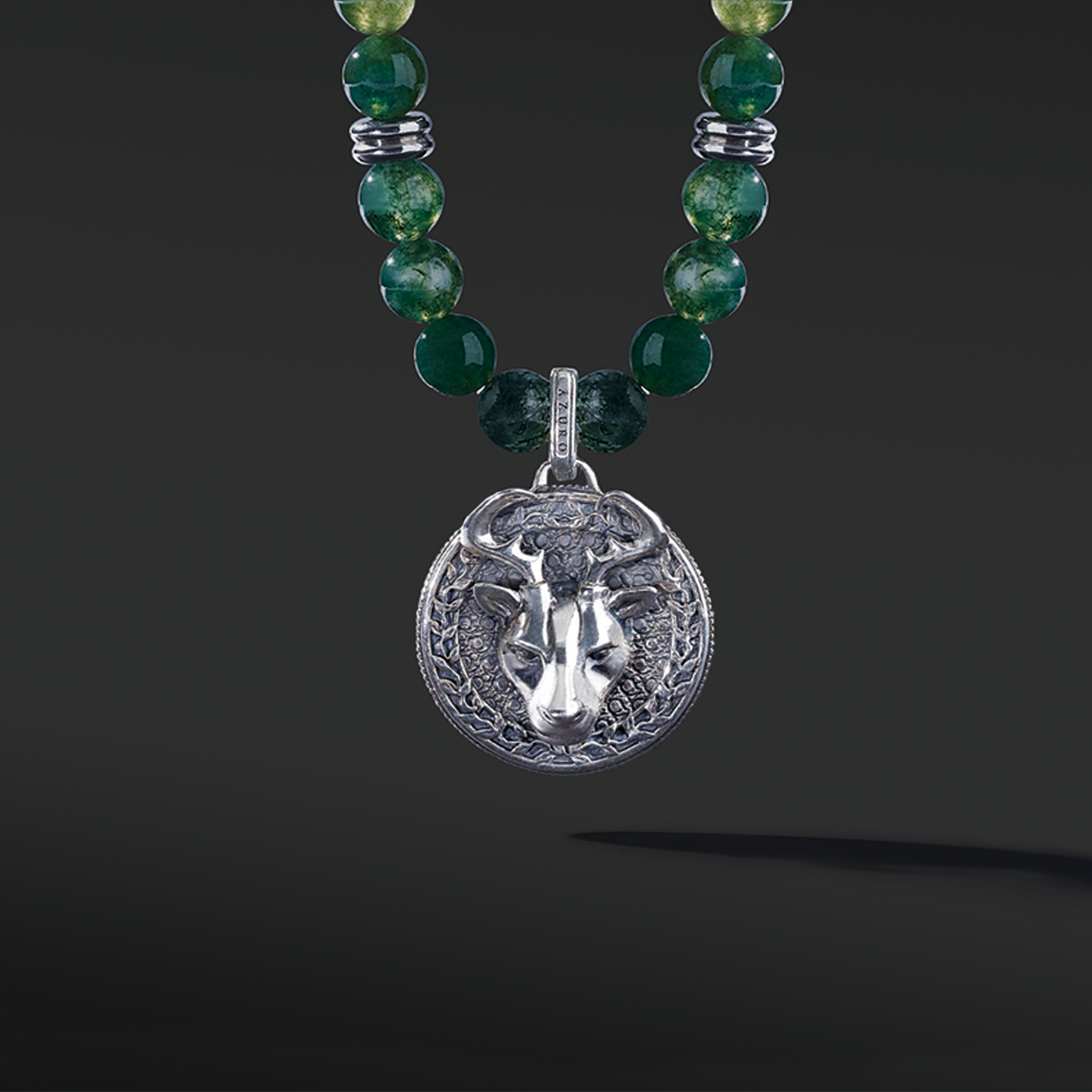 Know as the Green Moss Agate. One of the rarest agate crystals. Put 3 different tonalities of green Agate showcasing the richness of its presentation. Silver pendant necklace for men in green Agate has a gentle, sophisticated touch, and green Agate necklace releases stress and anxiety.