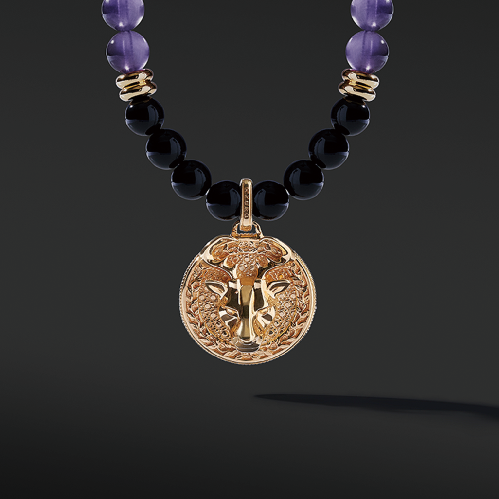 Gold Amethyst Beaded Necklace has a purple clarity and brings calmness. The attached gold connector and gold pendants give a luxurious presentation. Mens' gold pendant with a beaded necklace is a classic and unique style to carry.