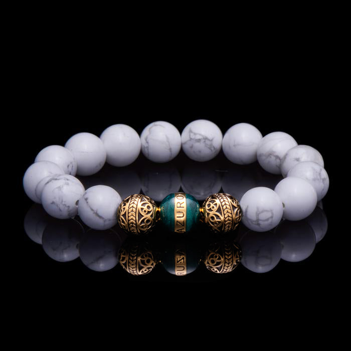 Howlite is a marble patterned borate mineral, and in its natural form presents a beautiful white crystal finished with delicate grey veins. The Howlite bracelet can bring clarity, facilitates awareness and stimulates desire for knowledge. The Turquoise howlite between the sterling silver beads is conducive to tranquility and calmness with its healing power.