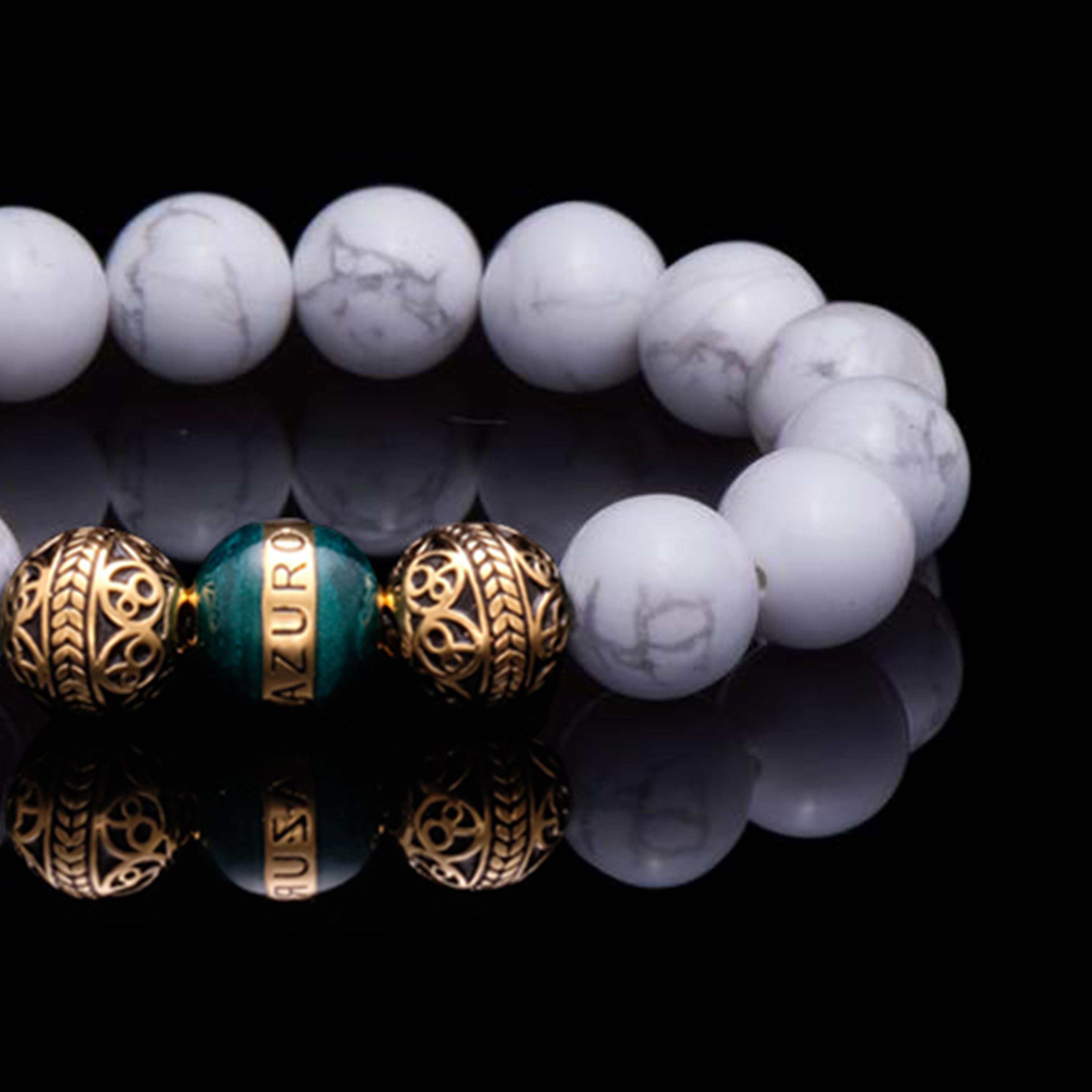 Howlite is a marble patterned borate mineral, and in its natural form presents a beautiful white crystal finished with delicate grey veins. The Howlite bracelet can bring clarity, facilitates awareness and stimulates desire for knowledge. The Turquoise howlite between the sterling silver beads is conducive to tranquility and calmness with its healing power.
