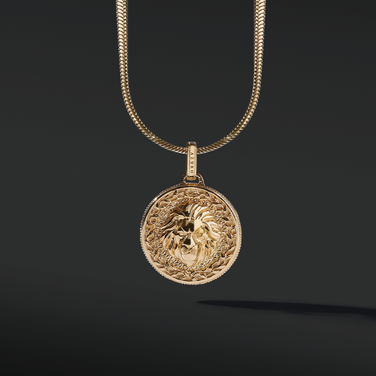 The gold lion pendant necklace is one of our iconic lion collections for men. A lion pendant is a reminder of carrying passion and ambition to everyday life. Gold with the hand polishing finishing of the lion pendant is an appreciation of craftsmanship and exceptional style. A men's gold pendant is more than a piece of jewelry but a statement of what you have achieved.