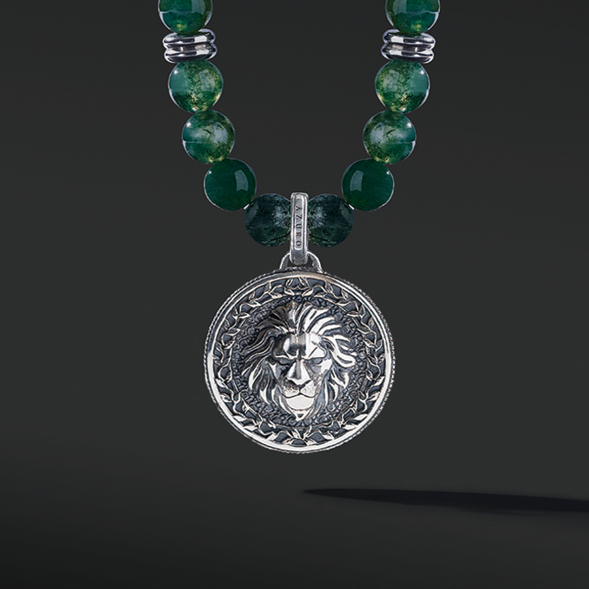 Know as the Green Moss Agate. One of the rarest agate crystals. Put 3 different tonalities of green Agate showcasing the richness of its presentation. Silver pendant necklace for men in green Agate has a gentle, sophisticated touch, and green Agate necklace releases stress and anxiety.