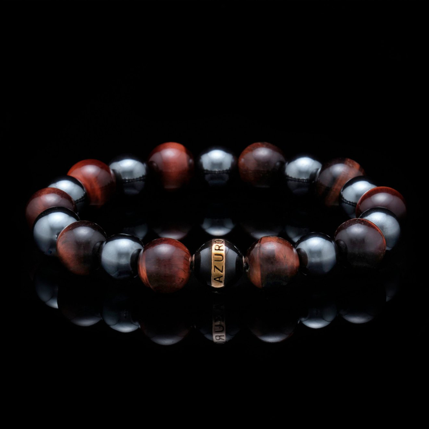 The Maximus, meaning "greatest" in Latin, is the symbolic red tiger eye bracelet for the ultimate fighter. The chakra healing bracelet promotes the properties of both red tiger eye and hematite, and act as a stimulating force of support for the feisty spirit of life. Red tiger eye bracelet infuses motivational energy, and with the gladiator-like Maximus, it will inject fuel for a boost of confidence for the man who strives to be the Greatest of All Time.