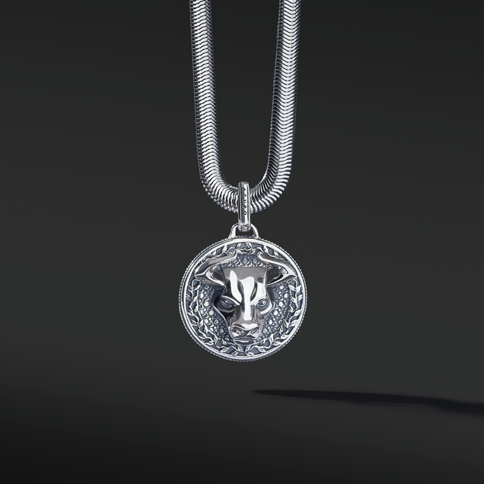 Bull silver pendant necklace in many cultures means prosperity, wealth, and it also means family and union. A bull silver pendant gives a solid appearance to a man. The fine polishing of the horns completes the sharpness of this creation. Azuro put together a collection of Bull pendants and bracelets.