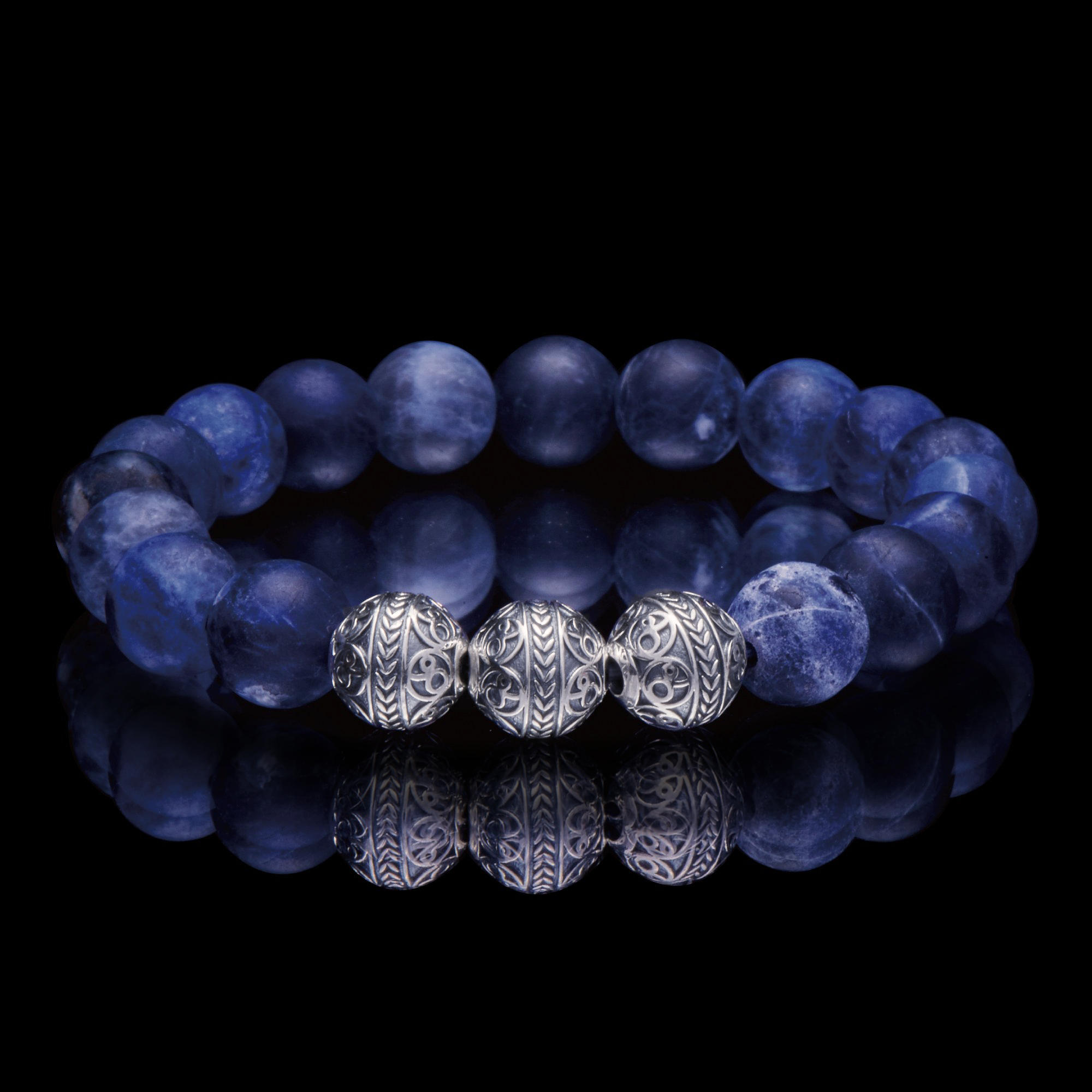 8mm Sodalite beaded bracelet, with sterling sliver outlet roundels.