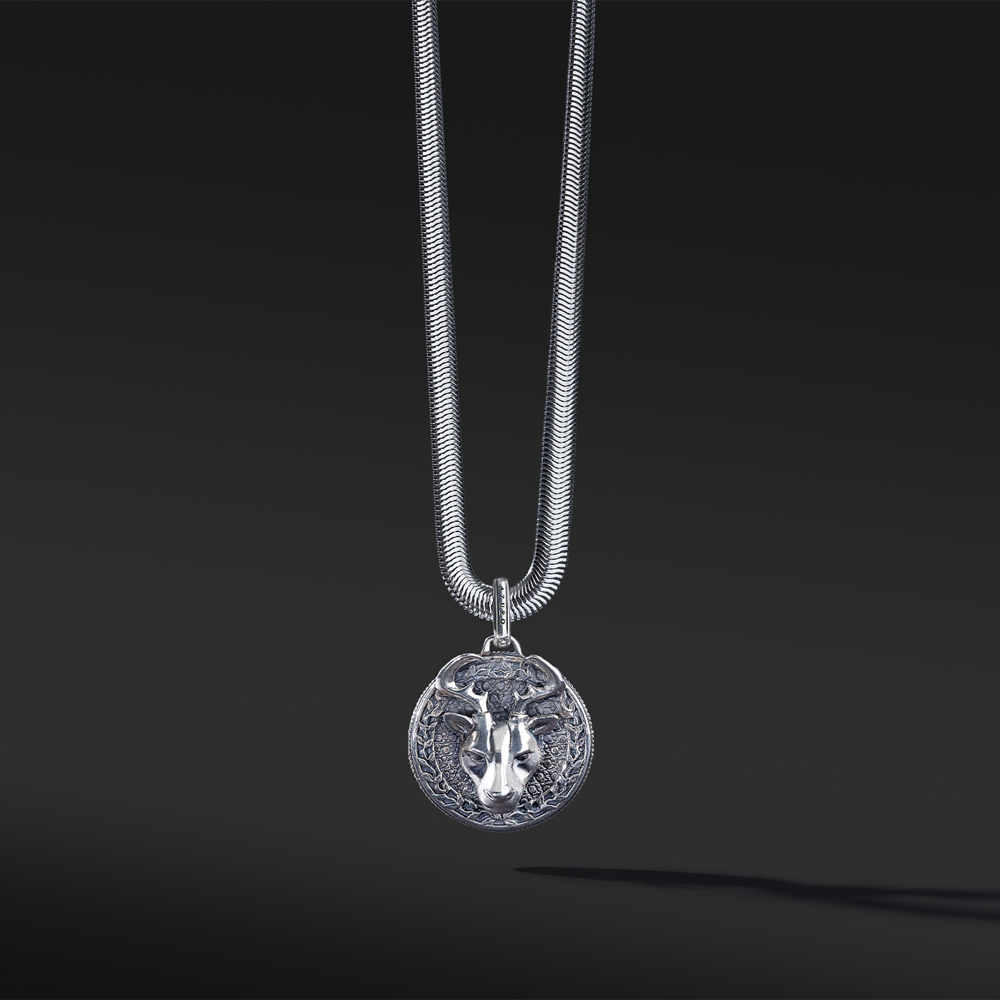 The silver deer pendant necklace for men is a unique existing. The idea originated from Milwaukee, Wisconsin. The deer is a masculine figure in the wild forest. If you are confident enough to master the bold silver pendant design, this buck head is a must-have silver pendant for men.
