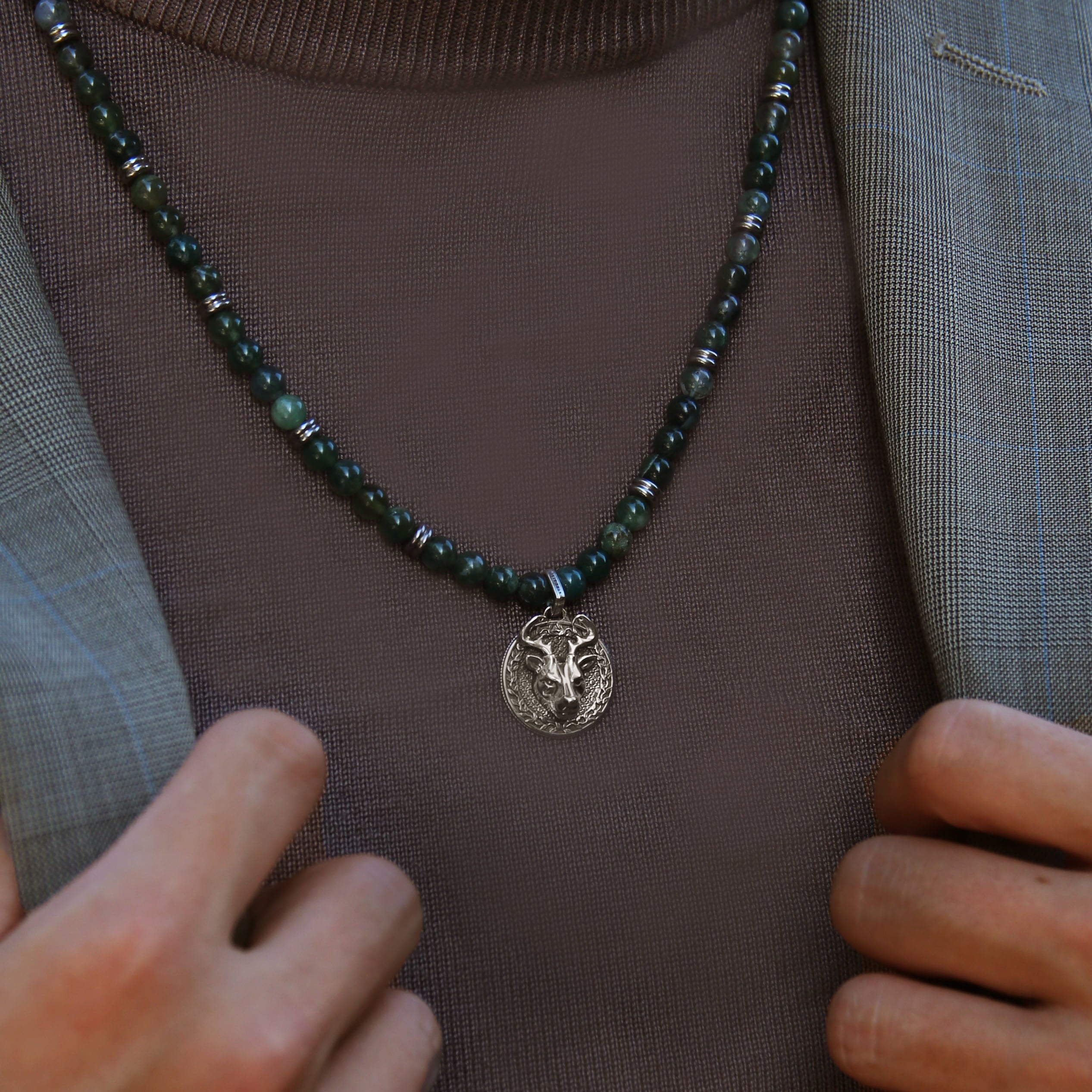 Know as the Green Moss Agate. One of the rarest agate crystals. Put 3 different tonalities of green Agate showcasing the richness of its presentation. Silver pendant necklace for men in green Agate has a gentle, sophisticated touch, and green Agate necklace releases stress and anxiety.