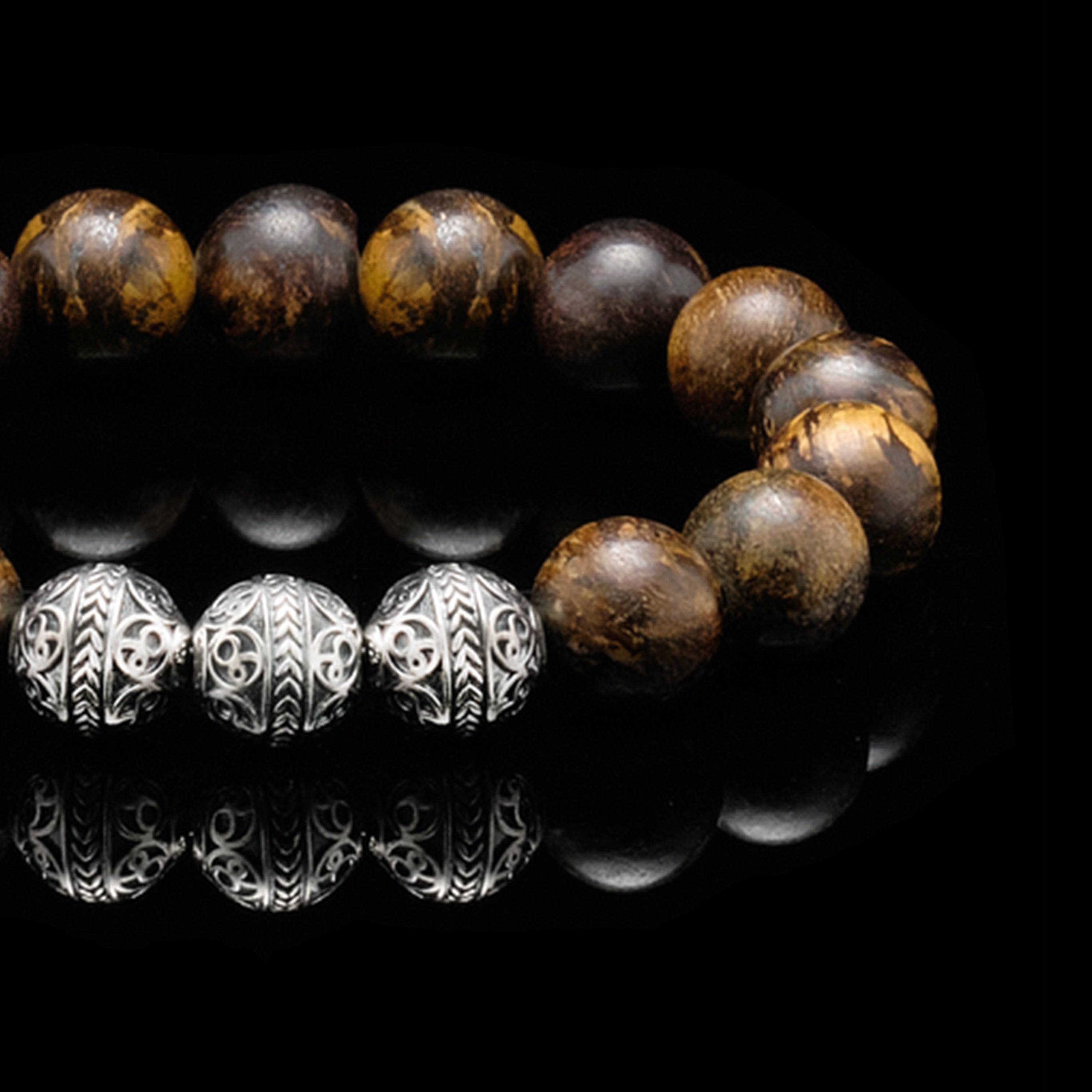 The Bronzite Stone is a truly beautiful gemstone with its bright golden flecks with 925 sterling silver, and it makes this men's beaded bracelet a classy addition to your wardrobe. The Sterling Silver Classic Bronzite can be easily paired up, so do it with other dark earth tones to build with the bronzite stone and incorporate those tones and you will more definitely pull out an elegant yet stylish outfit with this men's beaded bracelet.