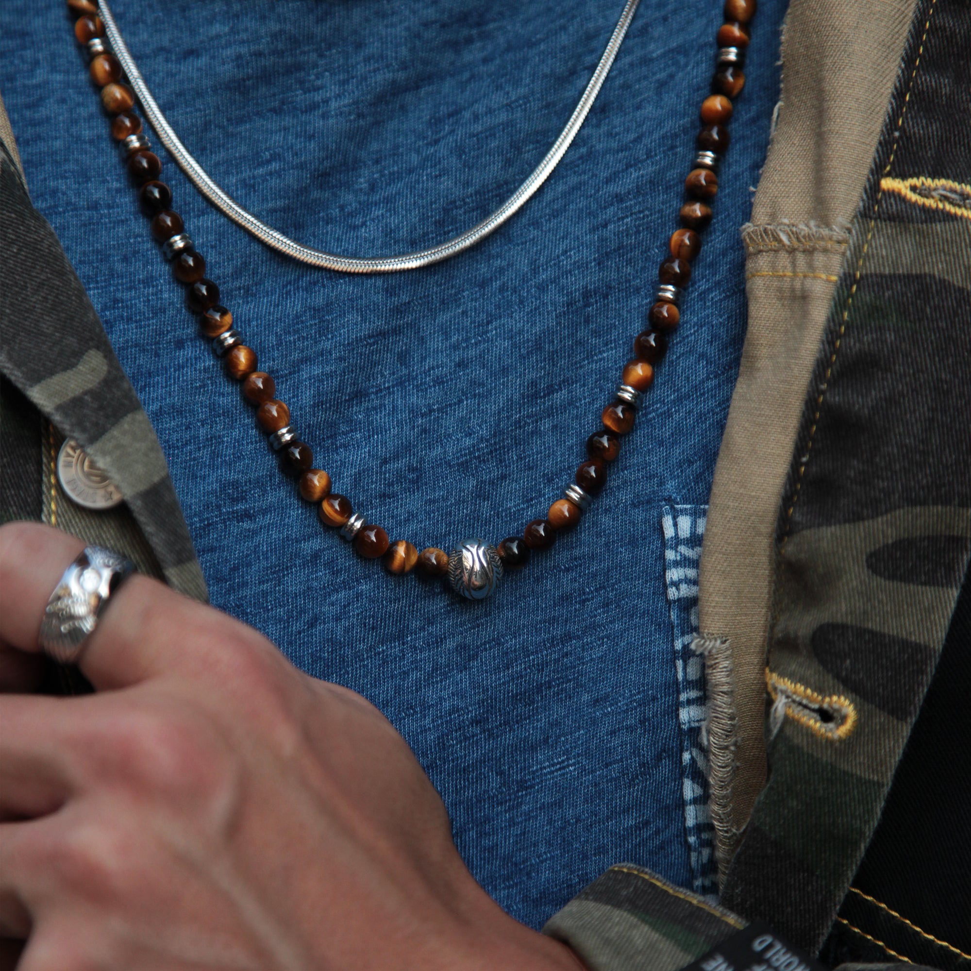 Angel Wing Necklace is one of our fine designer bracelets with limited stocks. Men's Crystal Necklace is the ultimate statement of your style and a silver Angel Wing bead adds sophisticated and luxurious elements to this men's necklace collection. Custom your silver necklace with different crystals and beads to create your personalized jewelry. Shop Men's Angel Wing Necklace today.