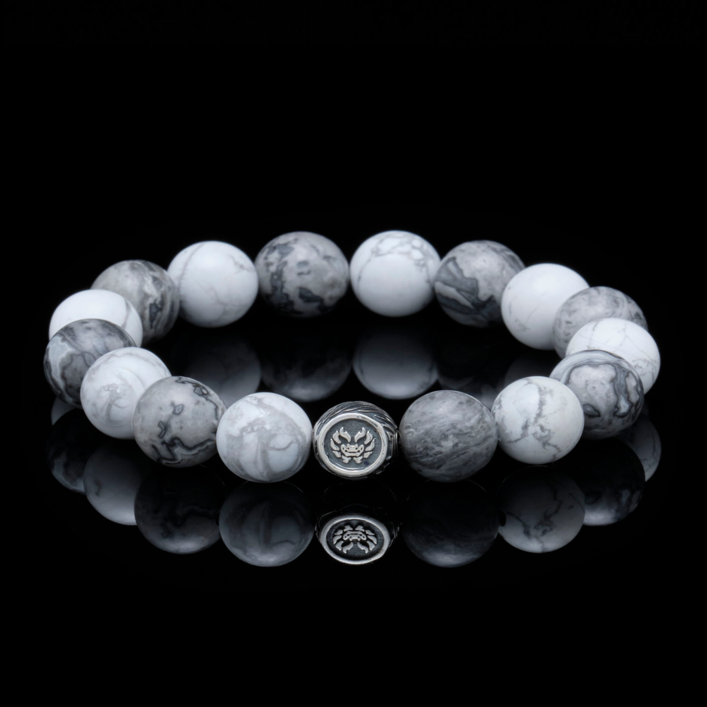 The Vault Hunter is our best-kept secret with a unique combination of howlite, picasso jasper, and dragrose gemstones. The howlite stone will initiate waves of tranquility to calm anxiousness, while the picasso jasper will lead towards desired goals.