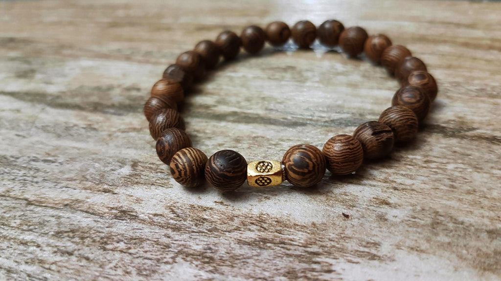 Men bracelet made of black ebony wood with silver mantra bead and natural  crystal bead | Black ebony, Bracelet collection, Bracelets for men