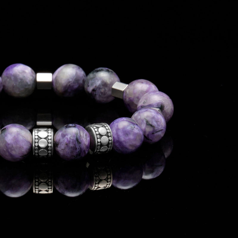 The Third Eye Chakra bracelet is one of the 7 Chakra bracelet. Combined with the charoite stone, this mens silver bracelet stimulates opens and dedication towards loved ones. Wearing a chakra bracelet has many benefits. The mens stainless steel bracelets with charoite stone can re-energize clarity and increase stamina with the chakra stones.