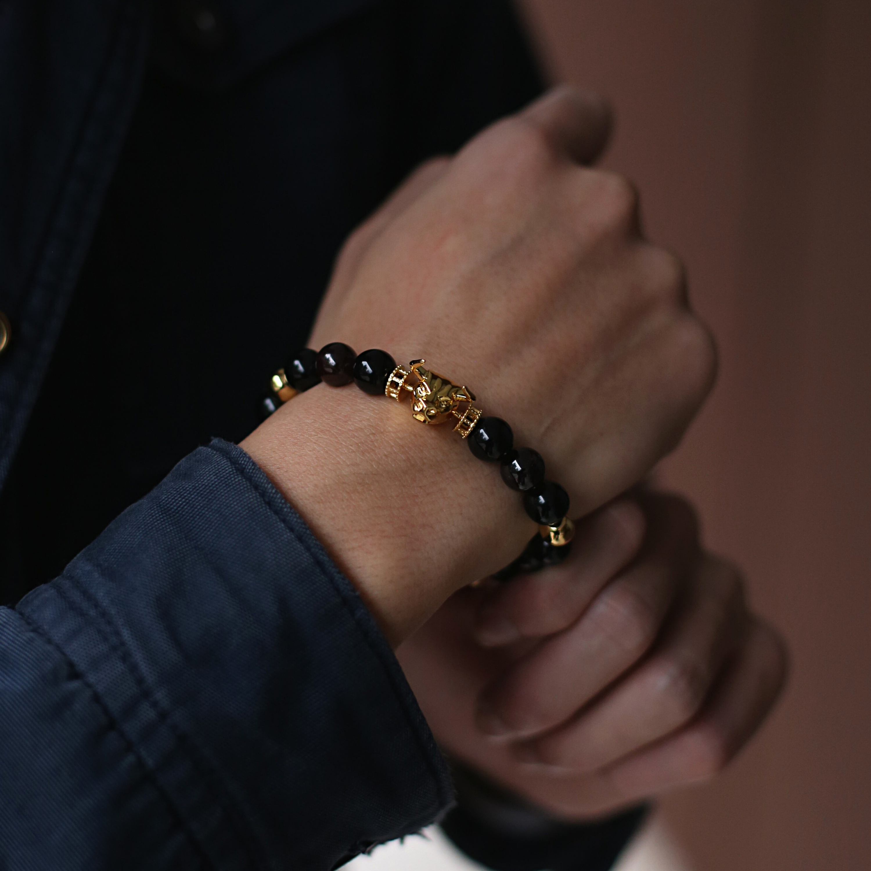 Selected crystals mixed with gold beads create layers and textures of the beaded bracelets. Designed this collection in three contrast color matchings provides a new look with Azuro Republic gold animal charms. A Lapis Lazuli bracelet, Obsidian bracelet, and Howlite bracelet is a great combination of any outfit.