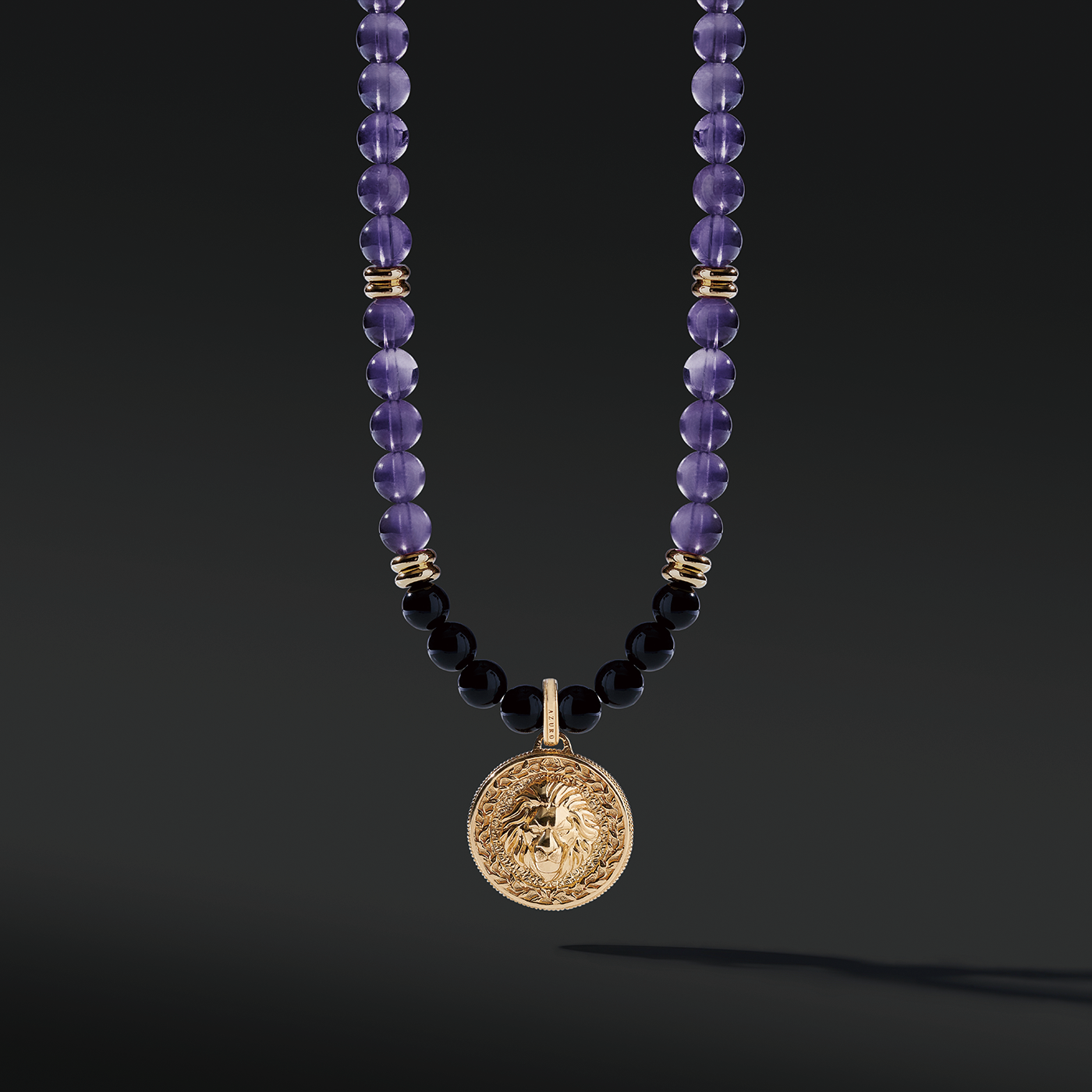 Gold Amethyst Beaded Necklace has a purple clarity and brings calmness. The attached gold connector and gold pendants give a luxurious presentation. Mens' gold pendant with a beaded necklace is a classic and unique style to carry.