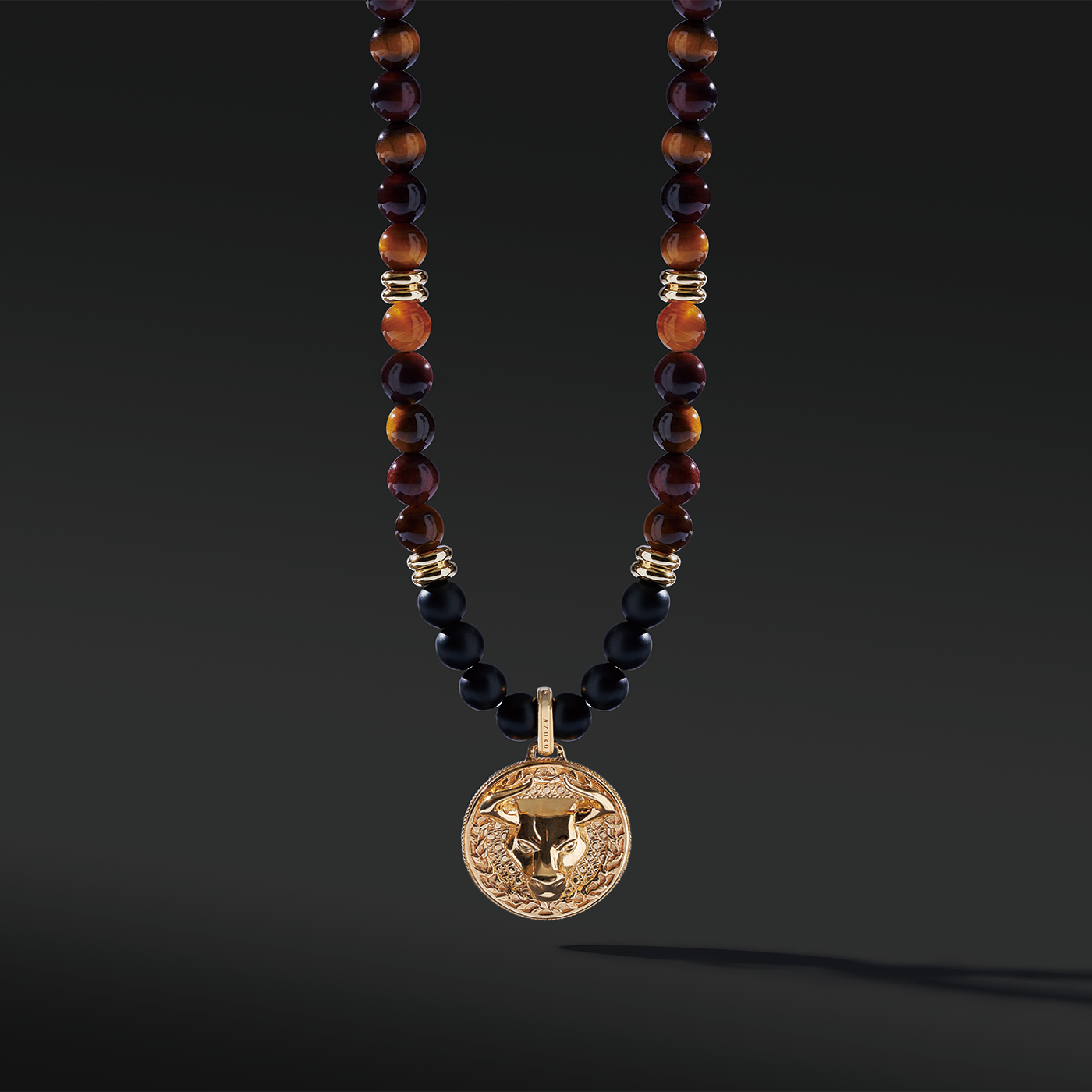 Tiger Eye beaded pendant necklace brings wealth and luck. A bottom set of Obsidian crystals highlights the detail of the silver pendant. Tiger Eye, Obsidian crystals amplify the healing properties of protection and prosperity. Azuro gold pendants provide options to complete all whole styles. Explore your gold pendant necklaces with us.