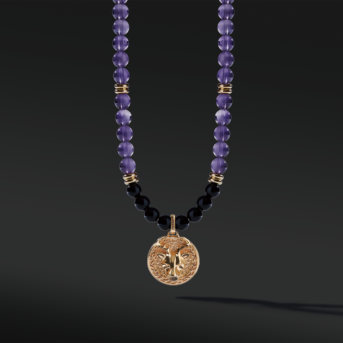 Gold Amethyst Beaded Necklace has a purple clarity and brings calmness. The attached gold connector and gold pendants give a luxurious presentation. Mens' gold pendant with a beaded necklace is a classic and unique style to carry. 