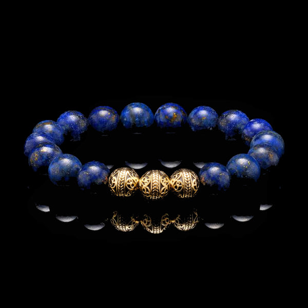 With its dotted stars of pyrite in blue, the Gold classic Lapis Lazuli Bracelet is not just a blue stone bracelet in appearance, but a must-have bracelet for men. Made with Lapis Lazuli Stone with an elegant touch of gold beads, this men's beaded bracelet is definitely a self-expression statement