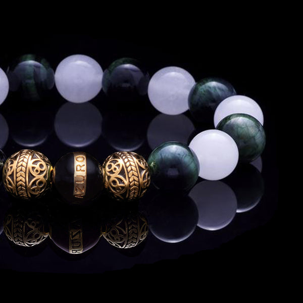 This collection is inspired by Kratos, the god of war. The hero who lead Sparta and defeated wrongful gods. Kratos was brave and never afraid, and we wanted to showcase everything he represents in one men's beaded bracelet, and we brought it to you, to become your best version. Infused in gold, we utilized two different gemstones to bring this men's beaded bracelet to life. 