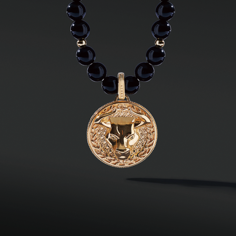 Obsidian pendant necklace in gold pendant takes the iconic black and gold color to life. Men's gold pendants attached to grade AAA Obsidian necklaces are a must-have. An Obsidian pendant necklace enlightens courage and amplifies strength. Gold pendants for men are classic jewelry a man should have.