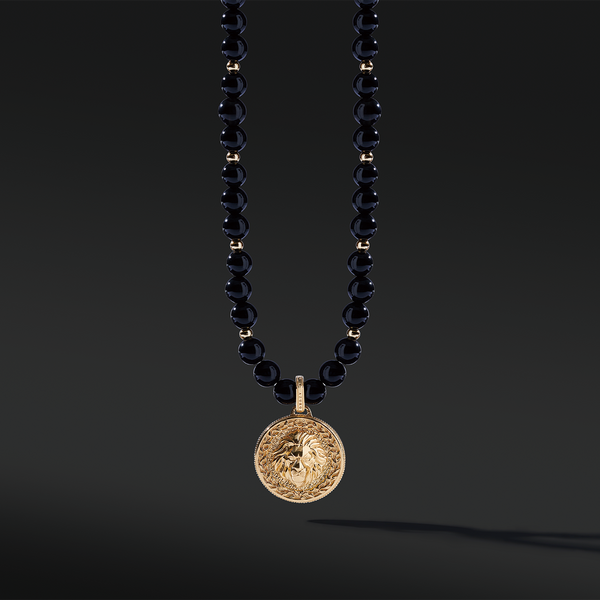 Obsidian pendant necklace in gold pendant takes the iconic black and gold color to life. Men's gold pendants attached to grade AAA Obsidian necklaces are a must-have. An Obsidian pendant necklace enlightens courage and amplifies strength. Gold pendants for men are classic jewelry a man should have. 