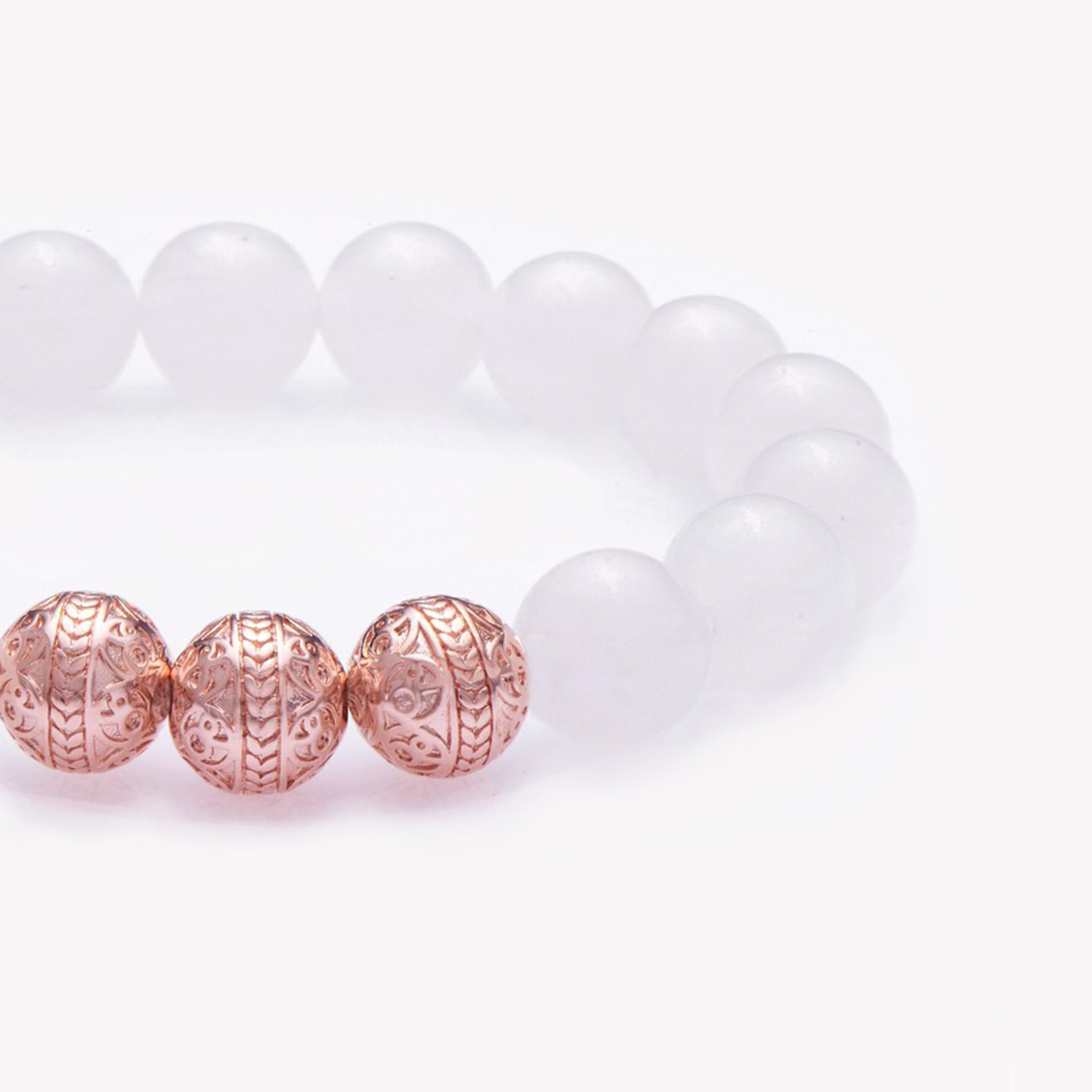 The White jade bracelet in combination with classic rose gold beads, promotes tranquility and radiates a peaceful glow. White Jade is made up of stunning nephrite jade stones with a translucent gleam. Representing unselfishness and hope, the White Jade bracelet inspires those in leadership roles to wear a white jade bracelet as they are the most trustworthy among a group, and can use the properties of bringing harmony and improving the cooperation in the workplace. 