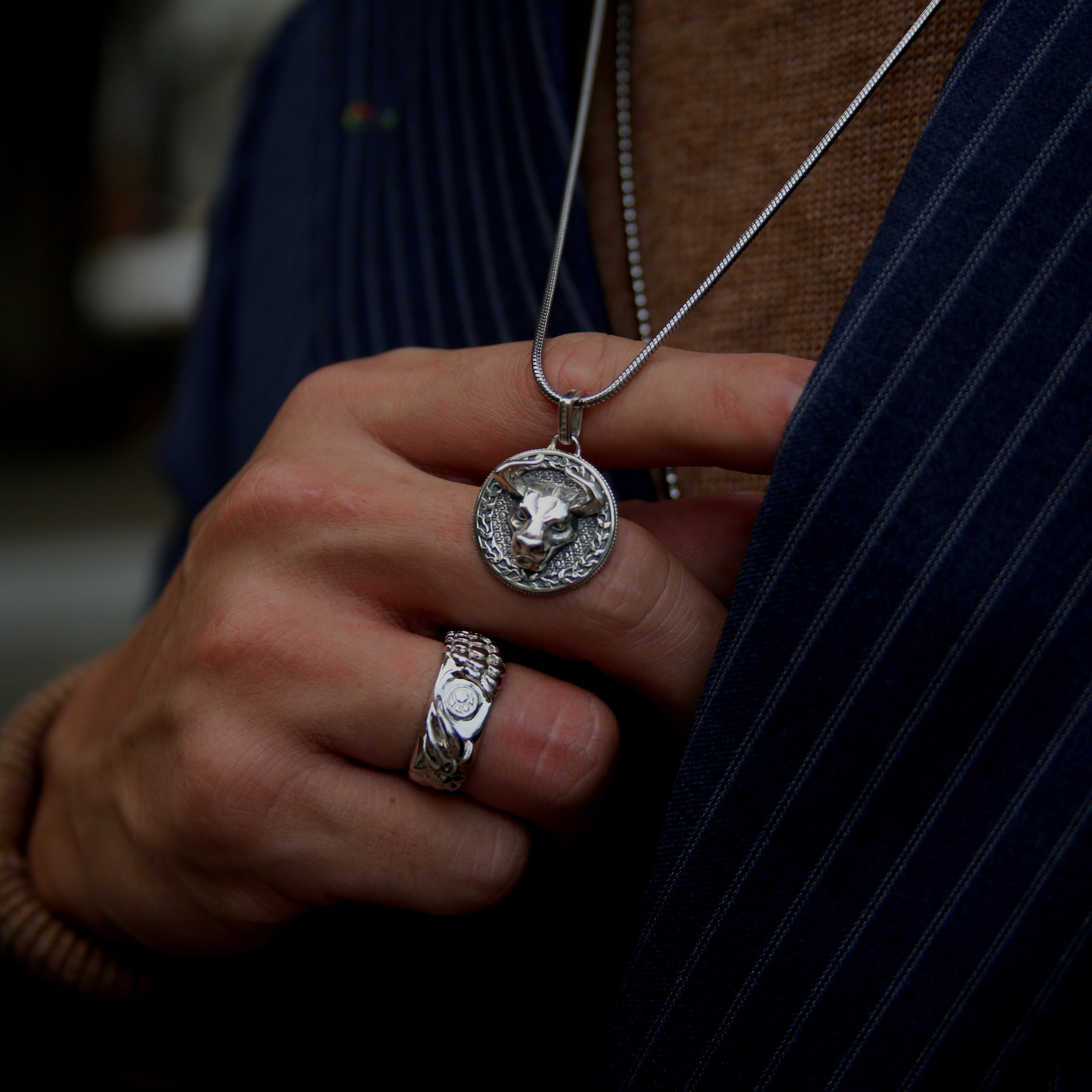 Bull silver pendant necklace in many cultures means prosperity, wealth, and it also means family and union. A bull silver pendant gives a solid appearance to a man. The fine polishing of the horns completes the sharpness of this creation. Azuro put together a collection of Bull pendants and bracelets.