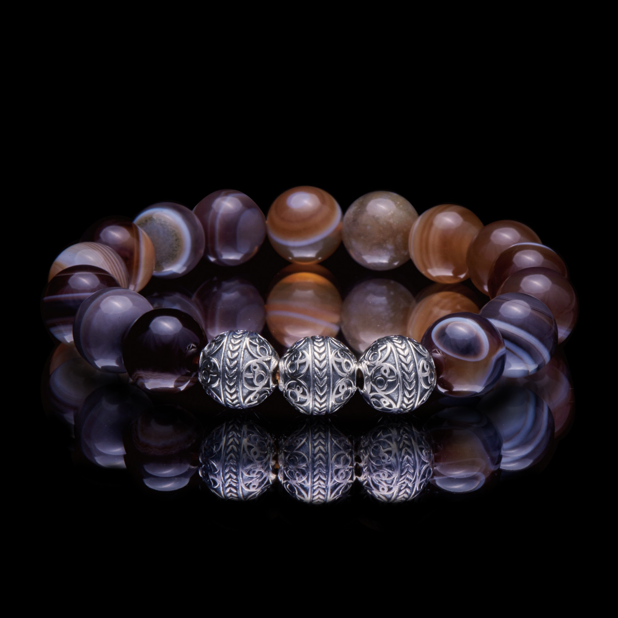 This Silver Classic Brown Agate Bracelet is the perfect mens beaded bracelet to have, made for any gentleman that experiences work-related stress from time to time, as this brown agate stone beaded bracelet with a touch of 925 sterling silver is one of the best mens bracelet to wear to achieve a calmer, more balanced state. 