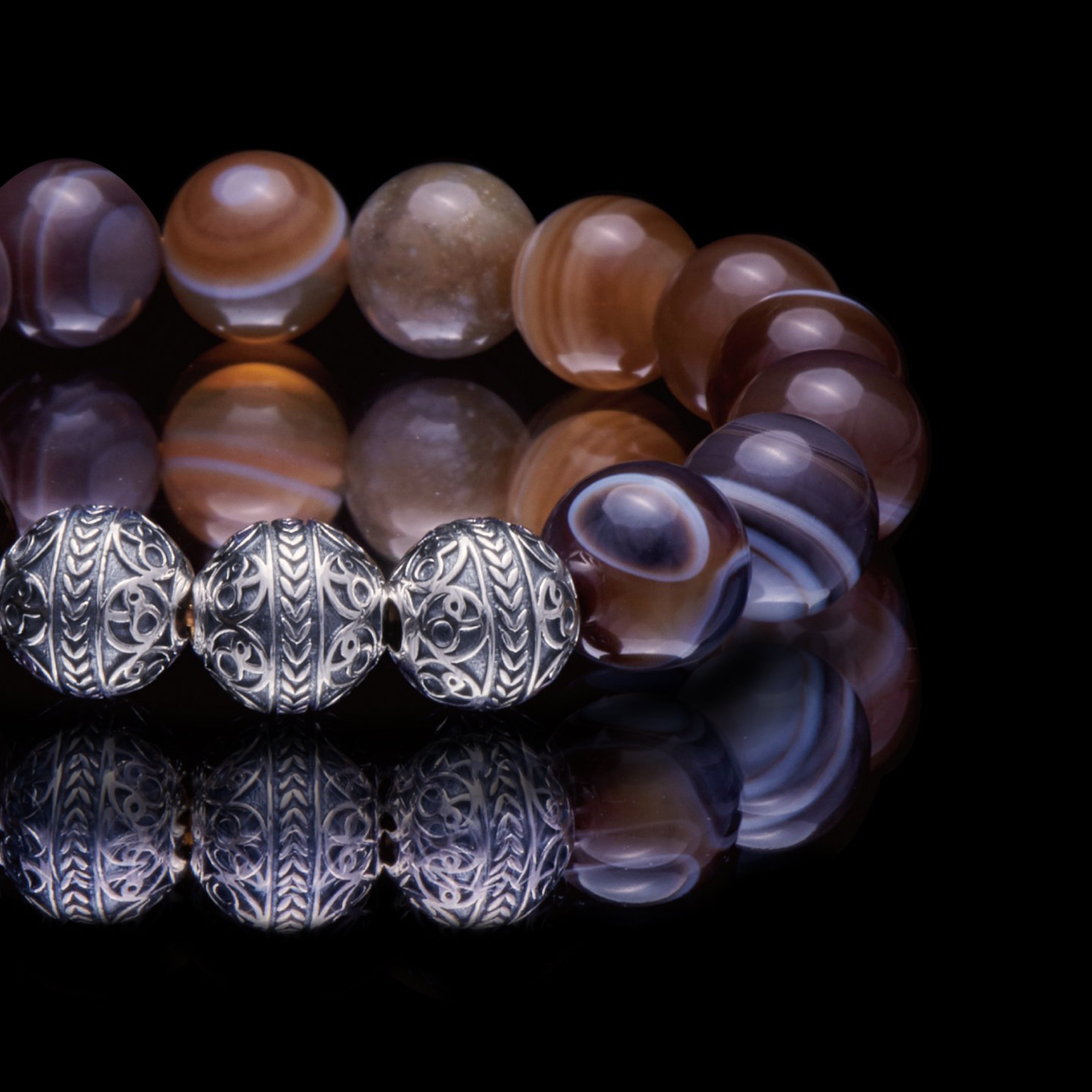 This Silver Classic Brown Agate Bracelet is the perfect mens beaded bracelet to have, made for any gentleman that experiences work-related stress from time to time, as this brown agate stone beaded bracelet with a touch of 925 sterling silver is one of the best mens bracelet to wear to achieve a calmer, more balanced state. 