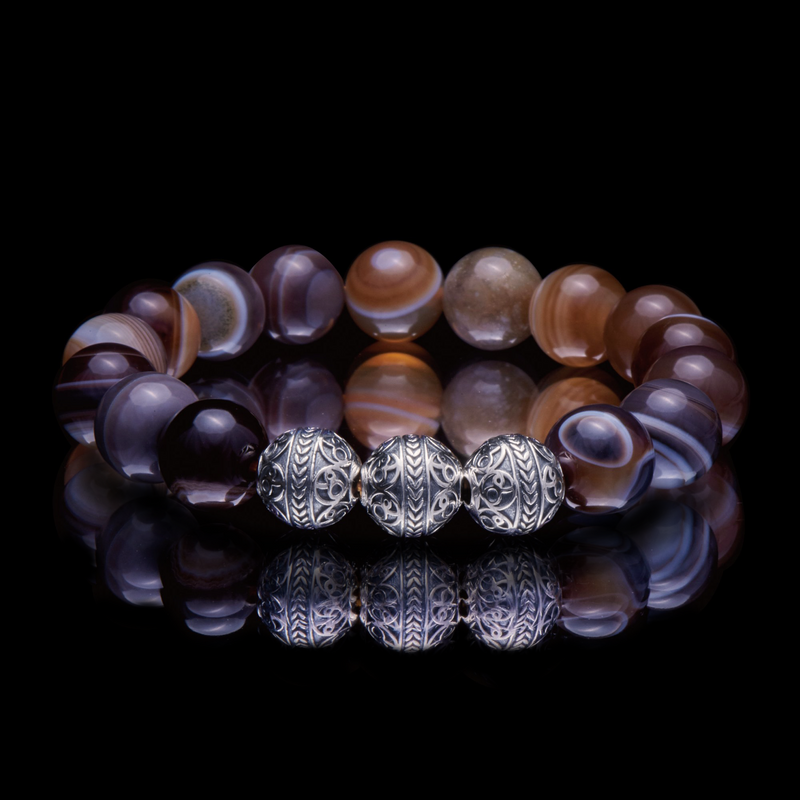 This Silver Classic Brown Agate Bracelet is the perfect mens beaded bracelet to have, made for any gentleman that experiences work-related stress from time to time, as this brown agate stone beaded bracelet with a touch of 925 sterling silver is one of the best mens bracelet to wear to achieve a calmer, more balanced state. 