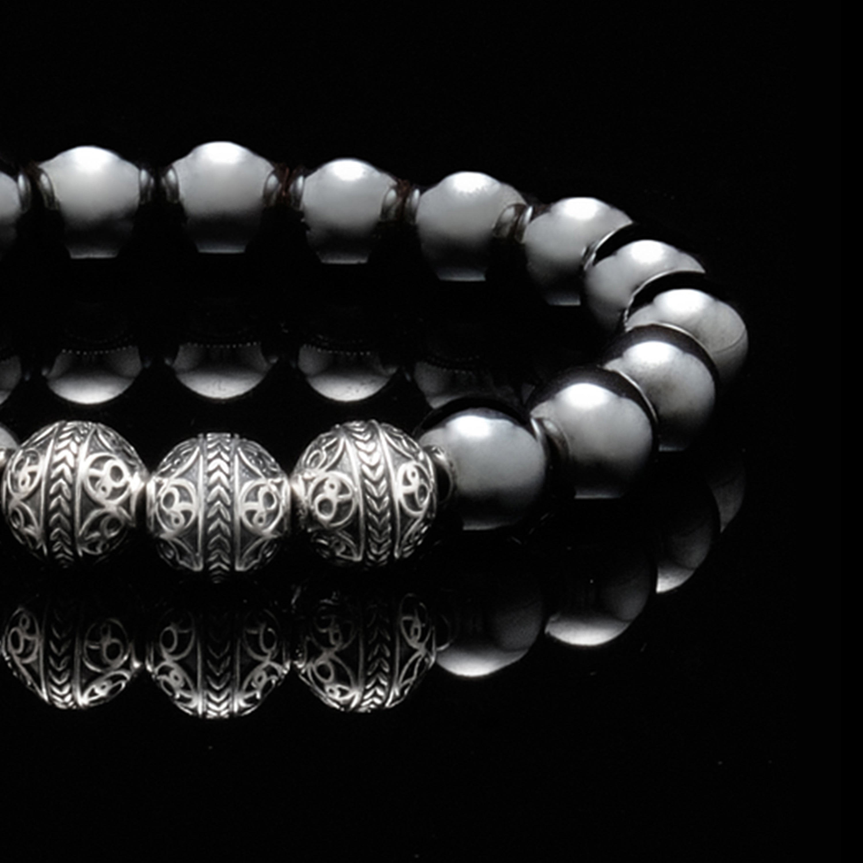 The Silver Classic Hematite, a mens bracelet made with silver and hematite stone. This classy yet fashionable beaded bracelet is definitely the one mens bracelet you have in your wardrobe. Hematite Stone has really powerful grounding energy; only keeping the hematite stone in your hand will help you feel it.