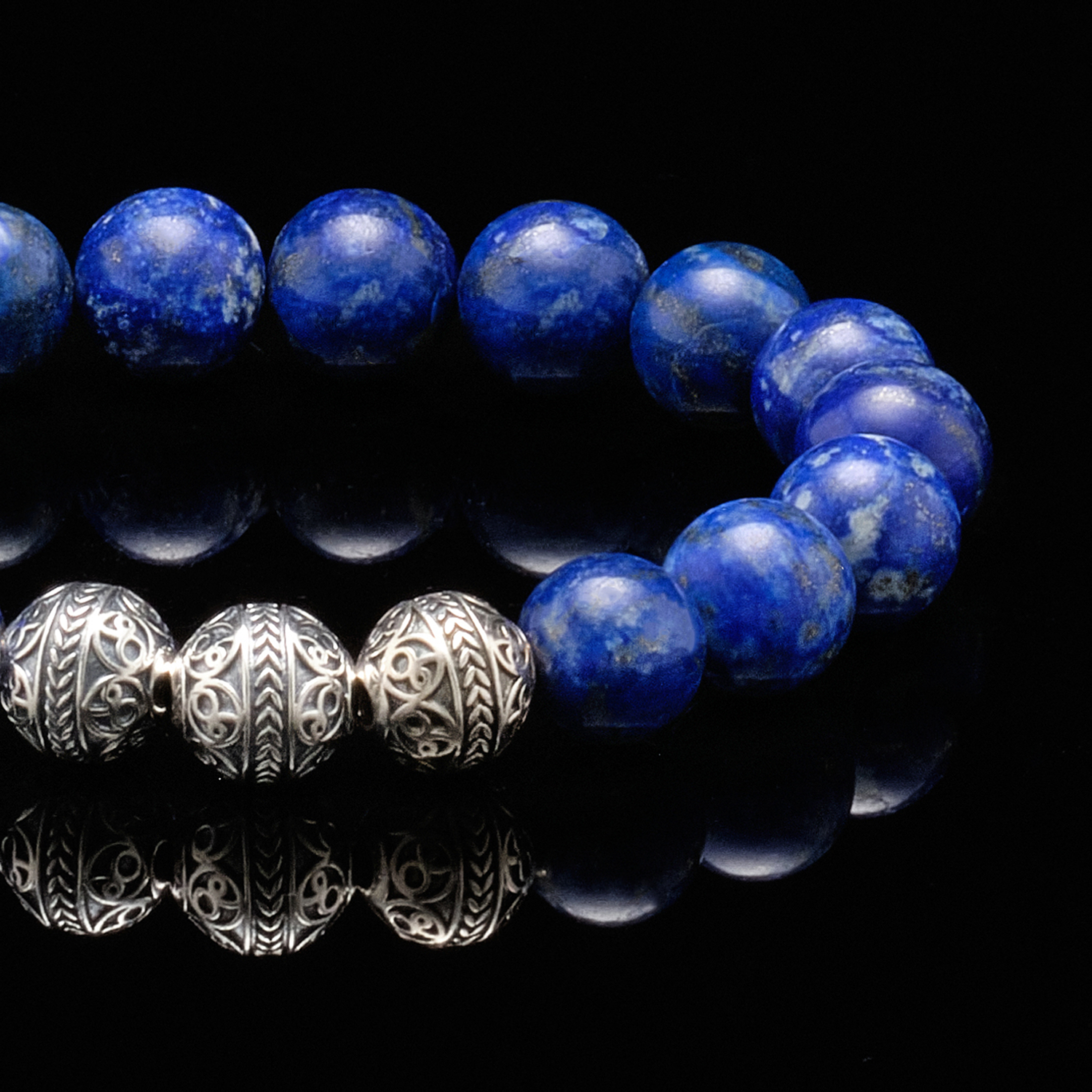 Often to attract the kind of prosperity we crave in our lives, we need to let go and go against the tide. This men's beaded bracelet will make you feel comfortable enough to do this. Made with beautiful Lapis Lazuli Stone, the famous ''Blue stone'', and 925 sterling silver beads