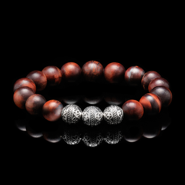 Made with Silver and Red tiger eye stone, the Matt Silver Red Tiger Eye bracelet has strong healing properties that keep your mind and body connected to the earth's energies. The red tiger eye stone is also known as the fighters gemstone, as when you wear this beaded bracelet with red tiger eye stone, you will feel the motivation to move forwards in life and it definitely helps you achieve whatever goal you have set for yourself.