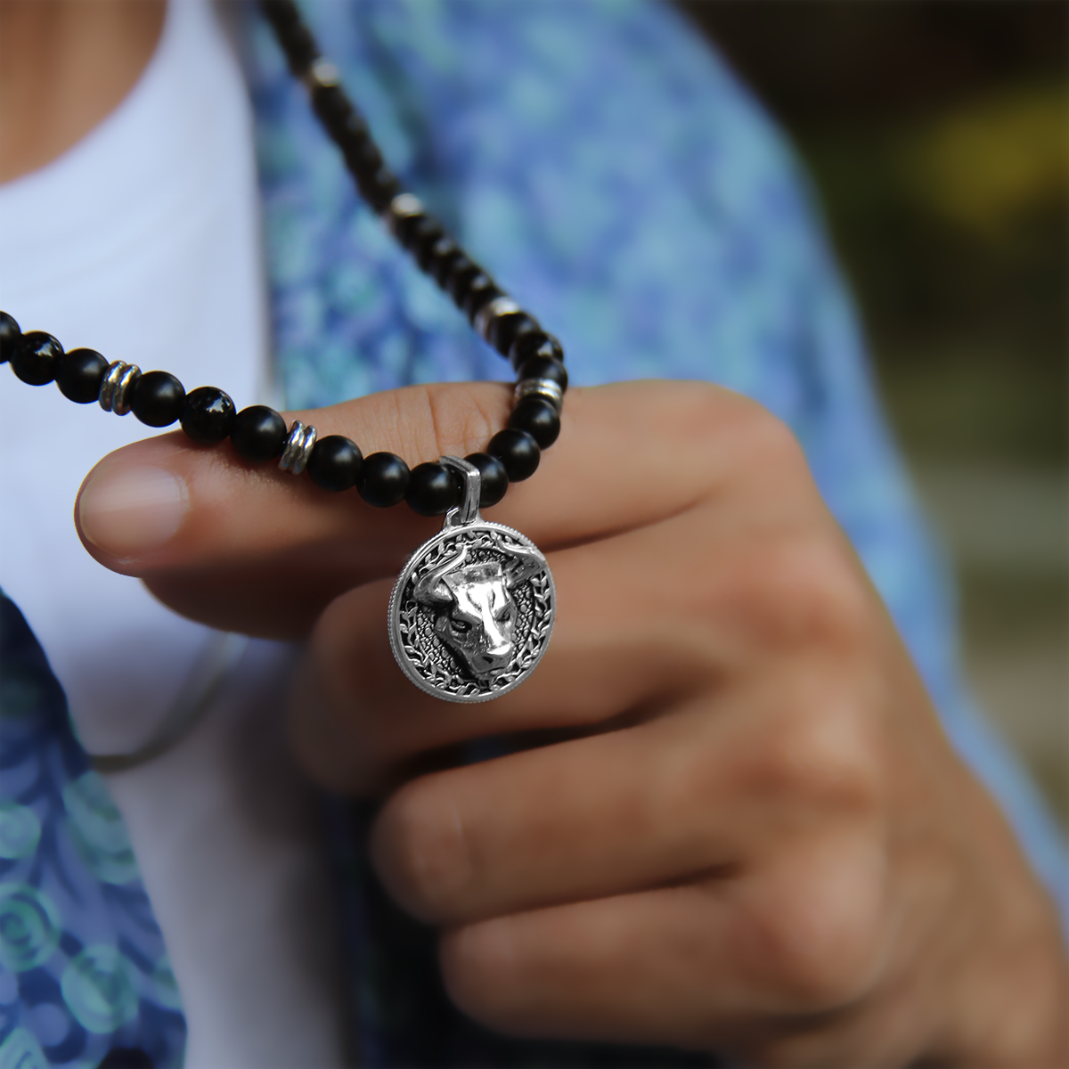 Obsidian men's pendant necklace is one of the popular men's beaded necklaces. Black Obsidian pendant necklace goes with every style, and the men's pendant brings in a solid statement. Silver pendant necklaces for men with oxidization show dominant masculinity.