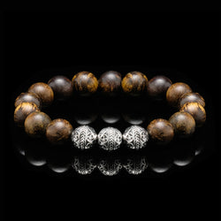 The Bronzite Stone is a truly beautiful gemstone with its bright golden flecks with 925 sterling silver, and it makes this men's beaded bracelet a classy addition to your wardrobe. The Sterling Silver Classic Bronzite can be easily paired up, so do it with other dark earth tones to build with the bronzite stone and incorporate those tones and you will more definitely pull out an elegant yet stylish outfit with this men's beaded bracelet.