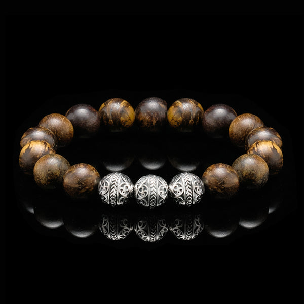 The Bronzite Stone is a truly beautiful gemstone with its bright golden flecks with 925 sterling silver, and it makes this men's beaded bracelet a classy addition to your wardrobe. The Sterling Silver Classic Bronzite can be easily paired up, so do it with other dark earth tones to build with the bronzite stone and incorporate those tones and you will more definitely pull out an elegant yet stylish outfit with this men's beaded bracelet.