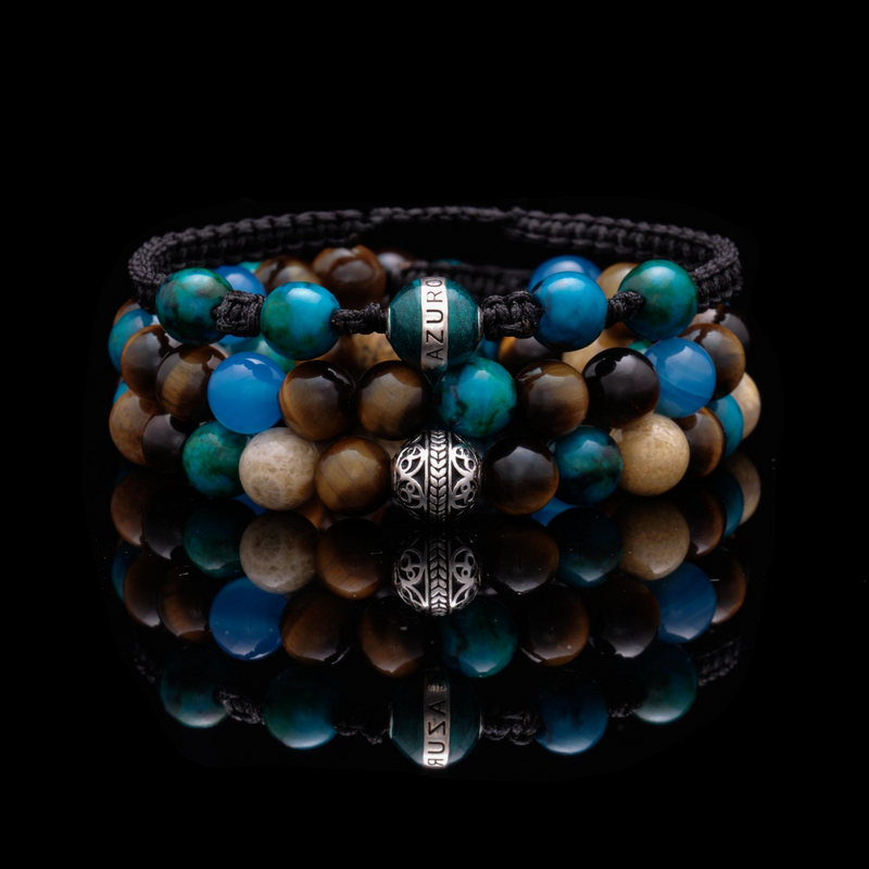 The Andaman stack mirrors the color and essence of the ocean, sand, and forest. Turquoise bracelets, chrysanthemum stones, tiger eye stone, and blue agate stones are combined into set of mens beaded bracelets for ultimate empowerment. Together they will attract happiness and spiritual motivation. Taken inspiration from mother nature, The Andaman kindles our appreciation of living in the moment and brings positivity for others. 
