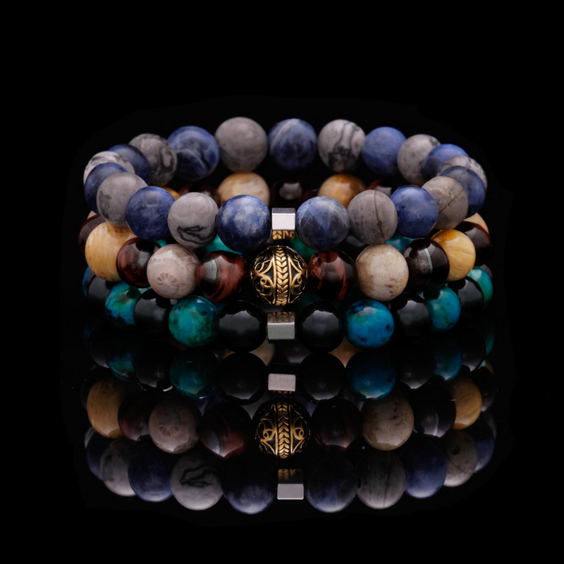 The Odin stack is a fusion of the red tiger eye stone, turquoise stone, obsidian stone, and sodalite stone bracelet. It is a guide to heighten your sensitivity and create the ultimate connection with your inner self. The favorited chrysanthemum stone, picasso jasper stone, and red tiger eye bracelet come together to accentuate knowledge and charisma. They bring a calming and balanced force to eliminate uncertainties and oblivion.