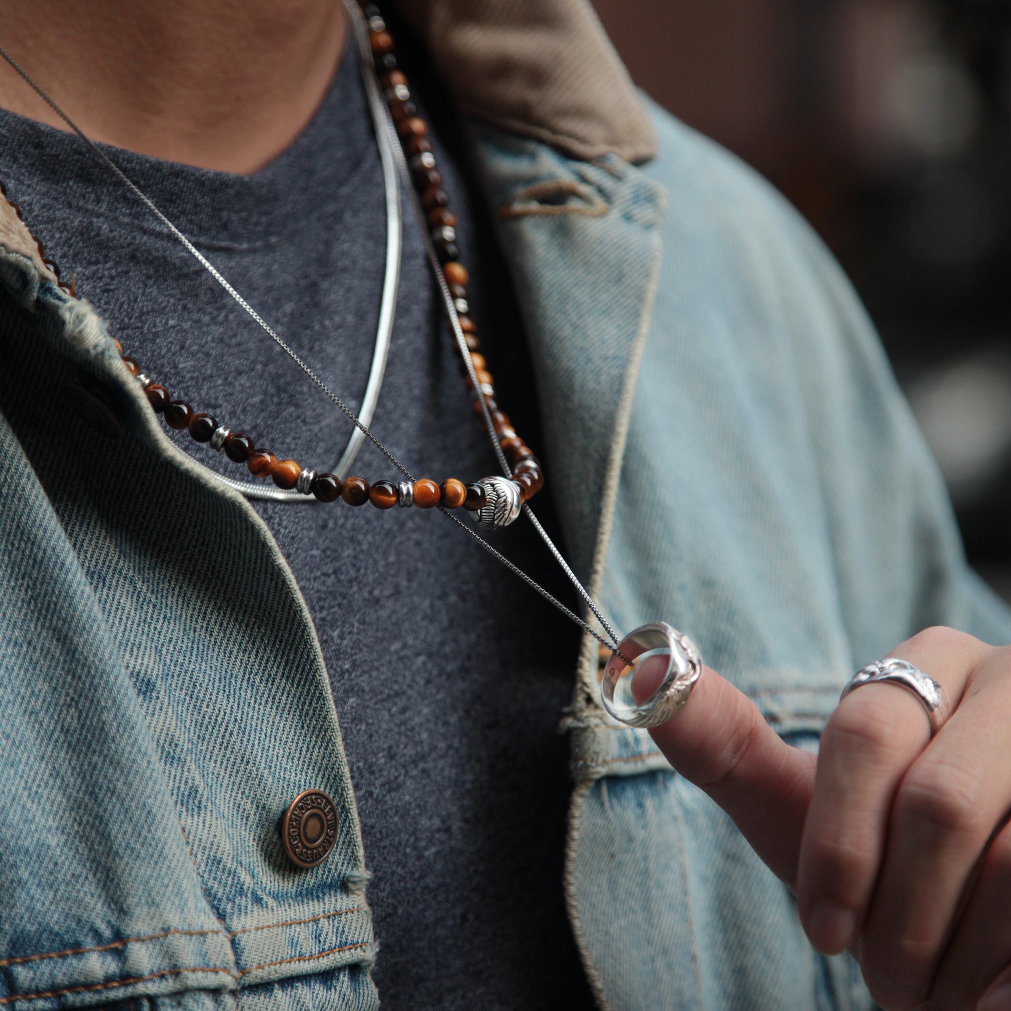 Angel Wing Necklace is one of our fine designer bracelets with limited stocks. Men's Crystal Necklace is the ultimate statement of your style and a silver Angel Wing bead adds sophisticated and luxurious elements to this men's necklace collection. Custom your silver necklace with different crystals and beads to create your personalized jewelry. Shop Men's Angel Wing Necklace today. 